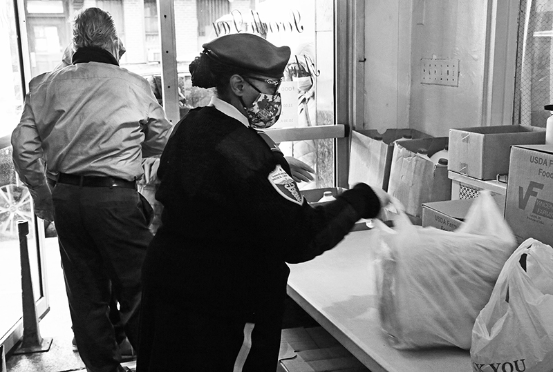 2020 : Food Lines : Seventh Day Adventists Help the Needy : Streetlife : New York City : Times Square : Richard Moore : Photographer : Photojournalist